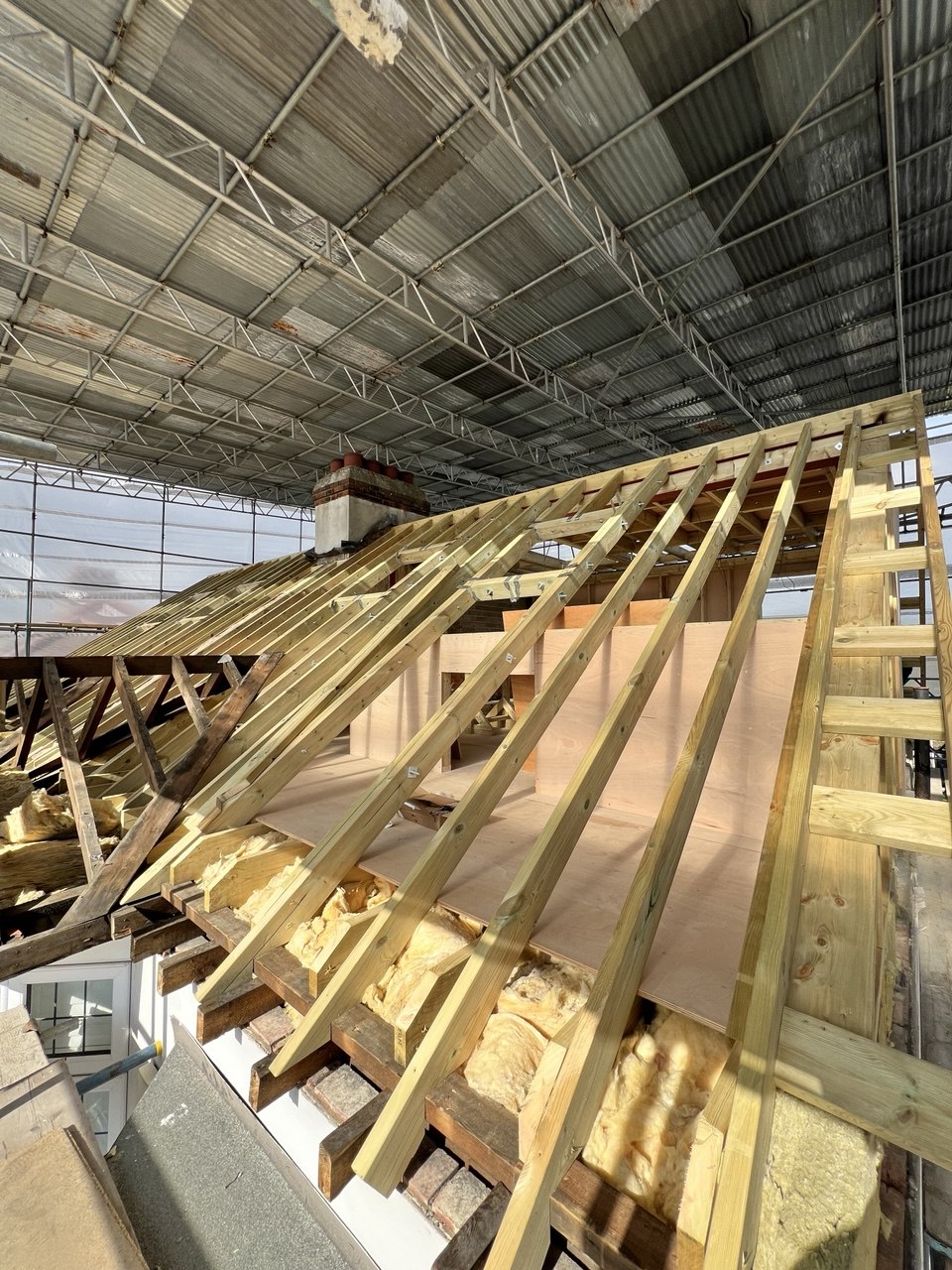 Roof building by Realm Carpentry